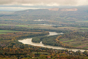 Naklejka premium Autumn Danube bend panorama with clouds from Pilis, background of the Naszály mountain.