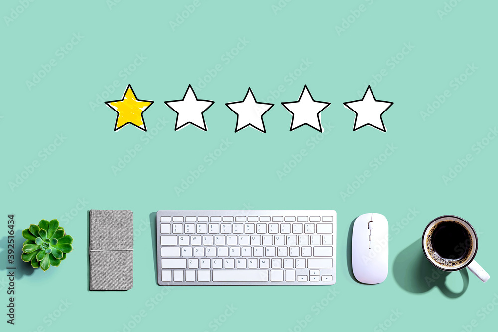 Poster one star rating with a computer keyboard and a mouse