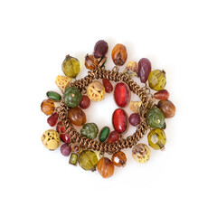 Golden bracelet with bracelet with gemstones isolated on a white background