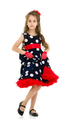 Front View Portrait of Girl in Retro Style Polka Dot Dress
