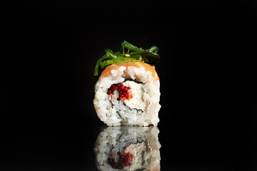 Sushi Rolls Set, maki, philadelphia and california rolls, on a Black background.