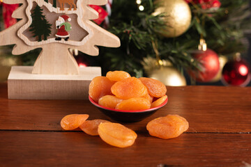 Dried apricots traditional christmas food. Christmas Party Decoration.