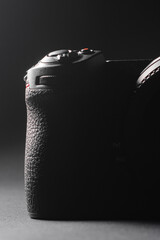 Shutter button and camera power button close up, rear view of the camera.