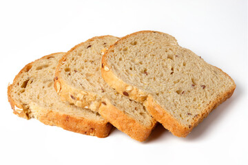 Three slices of whole grain bread with seeds isolated on white