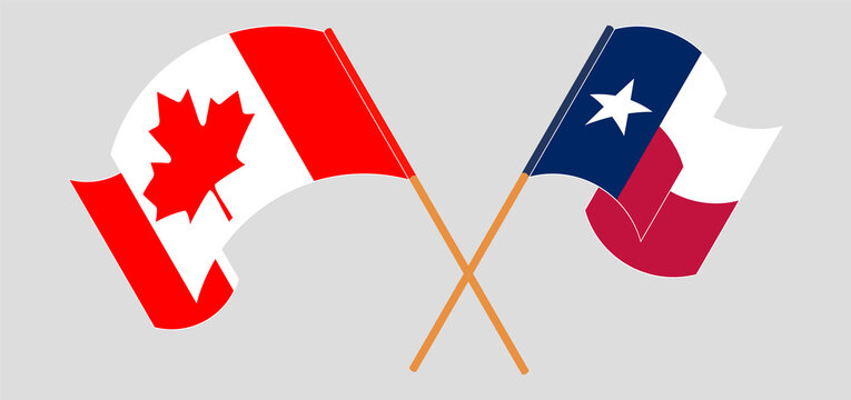 Crossed and waving flags of the State of Texas and Canada