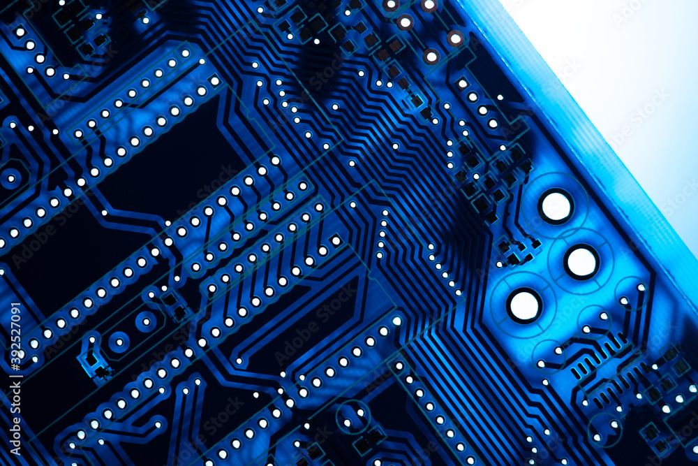Poster close-up of a printed circuit board with many holes. a fragment of a blank for creating a pcb. conce