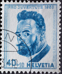 Switzerland - Circa 1953 : a postage stamp printed in the swiss showing a self-portrait by the...