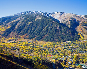 Bell Mountain - Overview of Aspen Colorado from smugglers road with golden trees and high elevation snow in Autumn with Bell Mountain in background, Pitkin County, Colorado