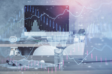 Multi exposure of financial graph drawing and office interior background. Concept of market analysis.