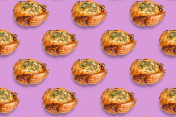 Seamless pattern of grilled chicken sprinkled with spices on a pink background. The view from the top. Original packaging design