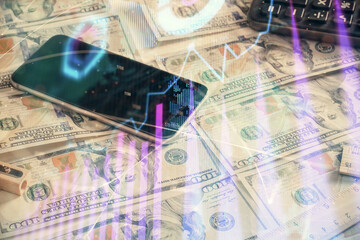 Double exposure of forex graph drawing over us dollars bill background. Concept of financial markets.