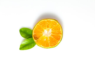 Orange fruit and leaves isolated on white background.