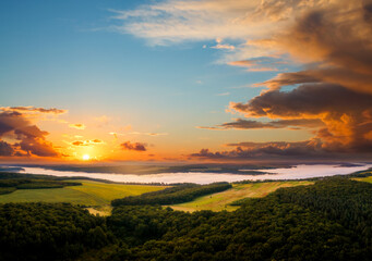 Fototapeta na wymiar Attractive top view on rural landscape at dawn.