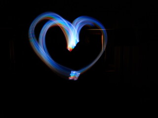glowing heart on black