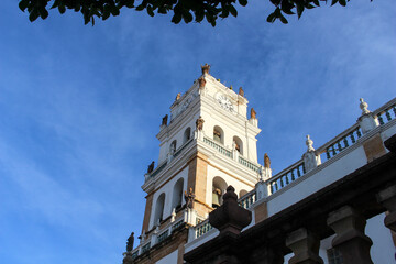 Fototapeta na wymiar view of historic colonial tower of sucre cathedral with clock and bells