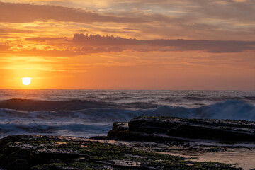 Sunrise over the sea on a beautiful morning at the beach