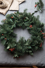 Fototapeta na wymiar Christmas decoration pine tree wreath. zero waste concept