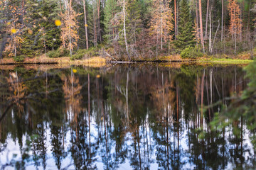Autumn view of Oulanka National Park, landscape, a finnish national park in the Northern Ostrobothnia and Lapland regions of Finland,  wooden wilderness hut, cabin cottage, bridge, campground place