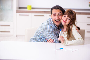 Young couple is very happy in pregnancy planning concept
