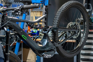 Fototapeta premium Objects tools and parts of a bicycle and the workshop where it is being fixed. 