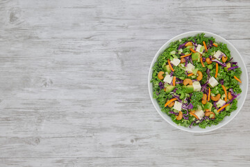 Avocado Kale Salad with Kale, Cashews, Avocado, Carrots, Red Onion, and Fresh Mozzarella.