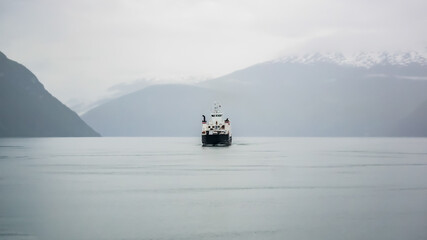 Trondheim, Norway - May 2016: Ferry boat sailing in a Norwegian fjord