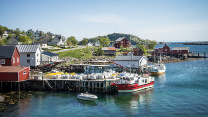 Fototapeta na wymiar Reine, Norway - June 2016: The fishing village of Reine in the Lofoten Islands of Norway, Scandinavia