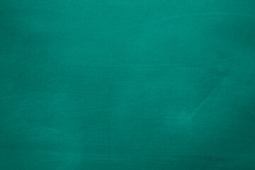 Abstract texture of chalk rubbed out on green blackboard or chalkboard background. School education, dark wall backdrop or learning concept.