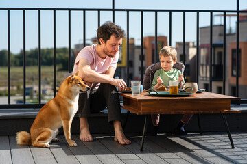 summer family Breakfast on the roof. Celebration of life's little moments concept
