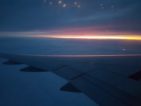 Airplane wing in the sky. View in the elluminator