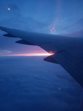 Airplane wing in the sky. View in the elluminator