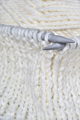 white wool knitted with spokes, handmade