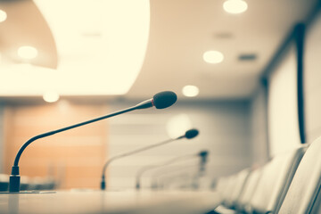 Close up the conference microphone at board room for meeting speaker and workshop presentation concepts