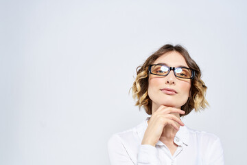 Fototapeta premium Woman business finance glasses work office light background portrait model