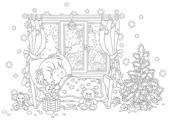 Cute little girl sleeping in her small bed on the night before Christmas, in a window of a nursery room magic reindeers flying Santa Claus with holiday gifts in his sleigh over snowy town