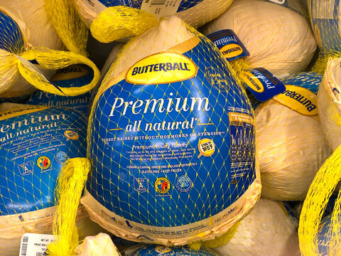 Alameda, CA - Nov 13, 2020: Grocery store freezer shelf with Butterball brand frozen turkeys. The most common main dish of a Thanksgiving dinner.