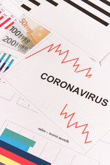 Currencies euro with downward graphs representing financial crisis caused by coronavirus. Covid-19