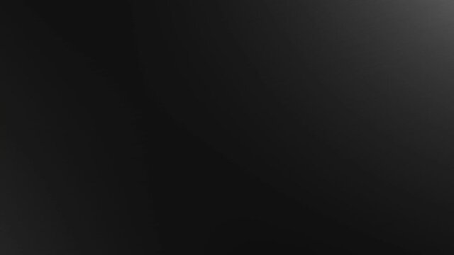 The write MESSAGE is passing on black background while a magnifier passes over it - 3D rendering animation video clip banner