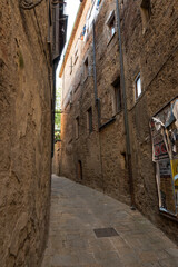Fototapeta na wymiar old town of volterra - italy. Charming little tight narrow streets of Volterra town in Tuscany, Italy, Europe