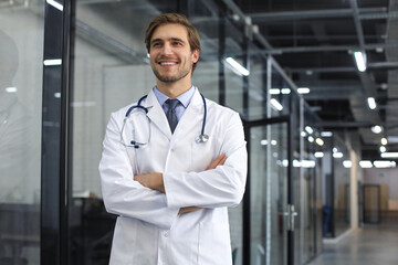 Portrait of young male doctor with stethoscope, close up