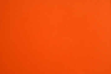 Orange background with empty copy space for text. Minimalist backdrop. Empty template design