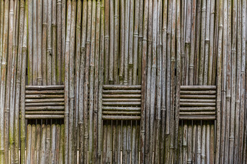 Weathered bamboo background with woven pattern