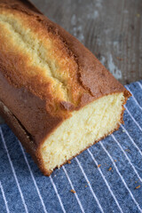 Lemon yogurt cake on rustic background