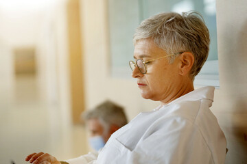 Profile view of doctor woman taking a break