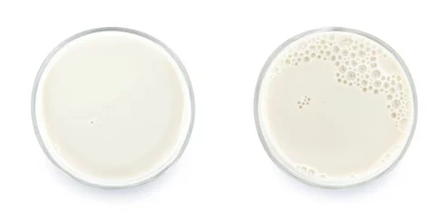 Fotobehang Glass of milk isolated on white background. From top view. © Smile Studio AP