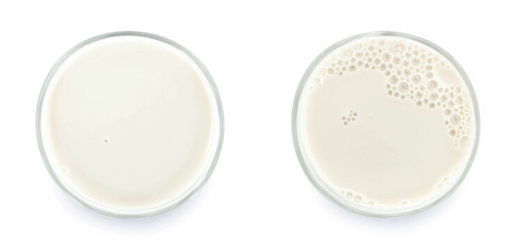 Glass Of Milk Isolated On White Background. From Top View.