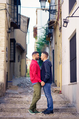 Fototapeta na wymiar Gay couple in a romantic moment in the street.