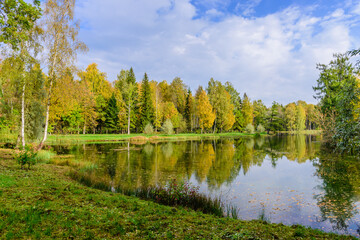 Fototapeta na wymiar Picturesque Park in autumn in Gatchina town, a suburb of Saint Petersburg, Russia