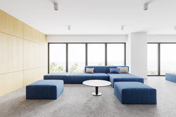 Wooden and white office waiting room with sofa
