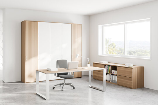White and wooden CEO office corner with window